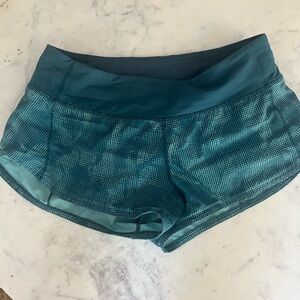 Size 4 2.5 inch speed up shorts. GUC but logo faded off